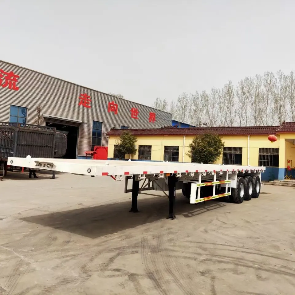 H39e299fc63484967a5df006a683233a8u.jpg_960x960.webp Flatbed semi-trailer 40ft Container Carrier Truck trailer - Image 1