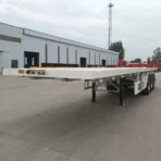 3 Axle Transport 20ft 40ft Container Flatbed Semi Trailer For Sale - Image 5